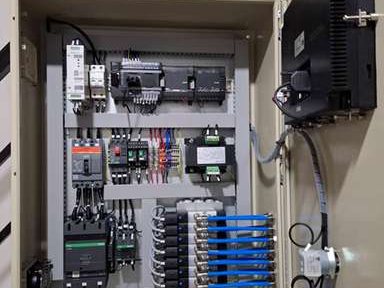 Rebuilt control panel interior with new contactors, breakers and terminal blocks