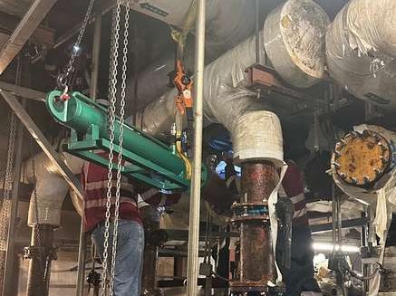 Line stop equipment rigged into position above the valve being replaced
