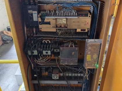 Machine control panel before rehabilitation — obsolete controller and unlabelled wiring
